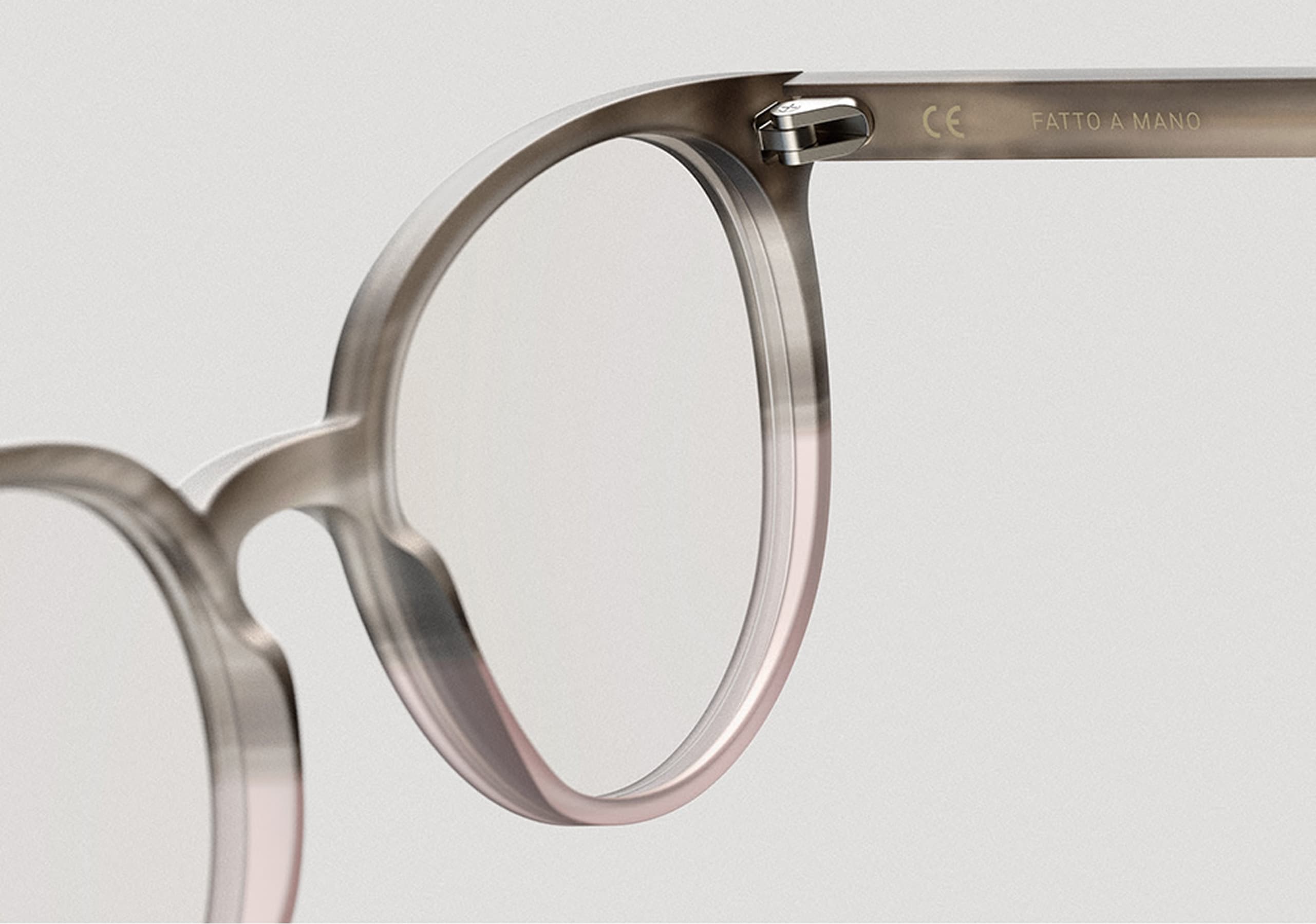 Handcrafted eyewear displayed in a workshop.